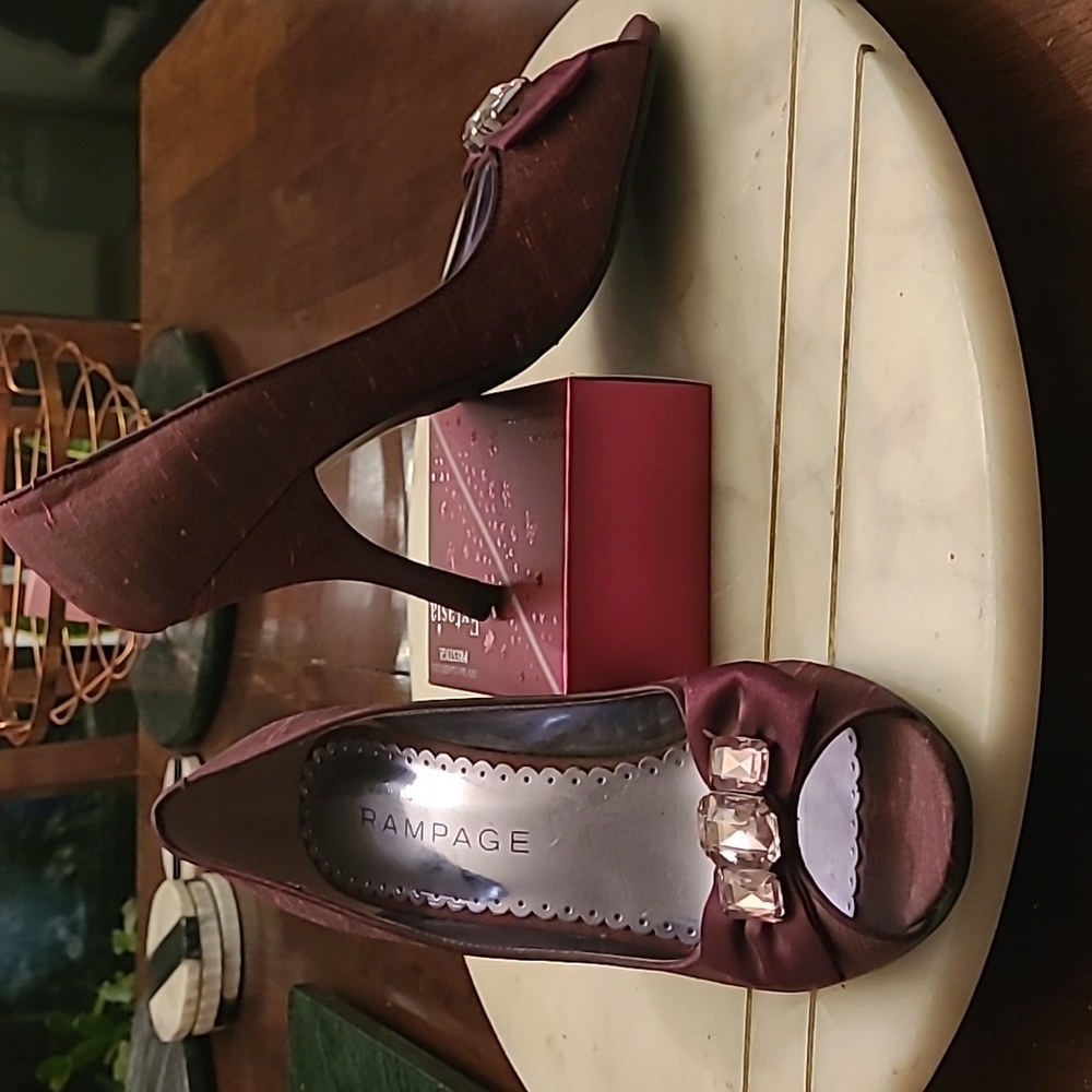 Burgundy red peeptoe heels with pink rhinstones and bows.